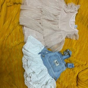Two infant dresses size 3-6 and 6 months.